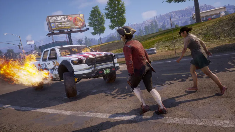 A zombie in a tricorn hat is about to get creamed by a red, white, and blue truck.