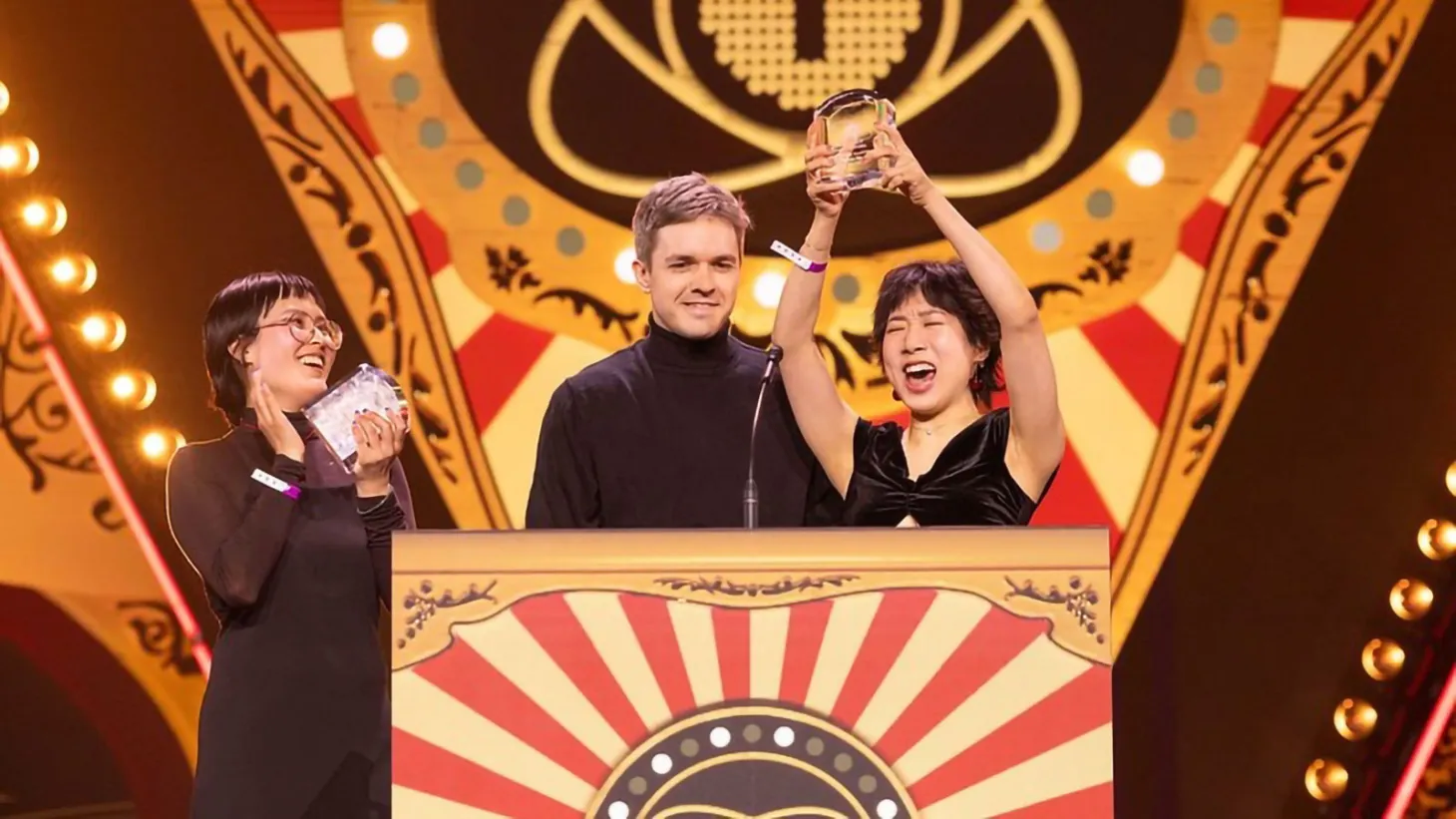 Jenny Jiao Hsia and AP Thomson accepting the Seumas McNally Grand Prize